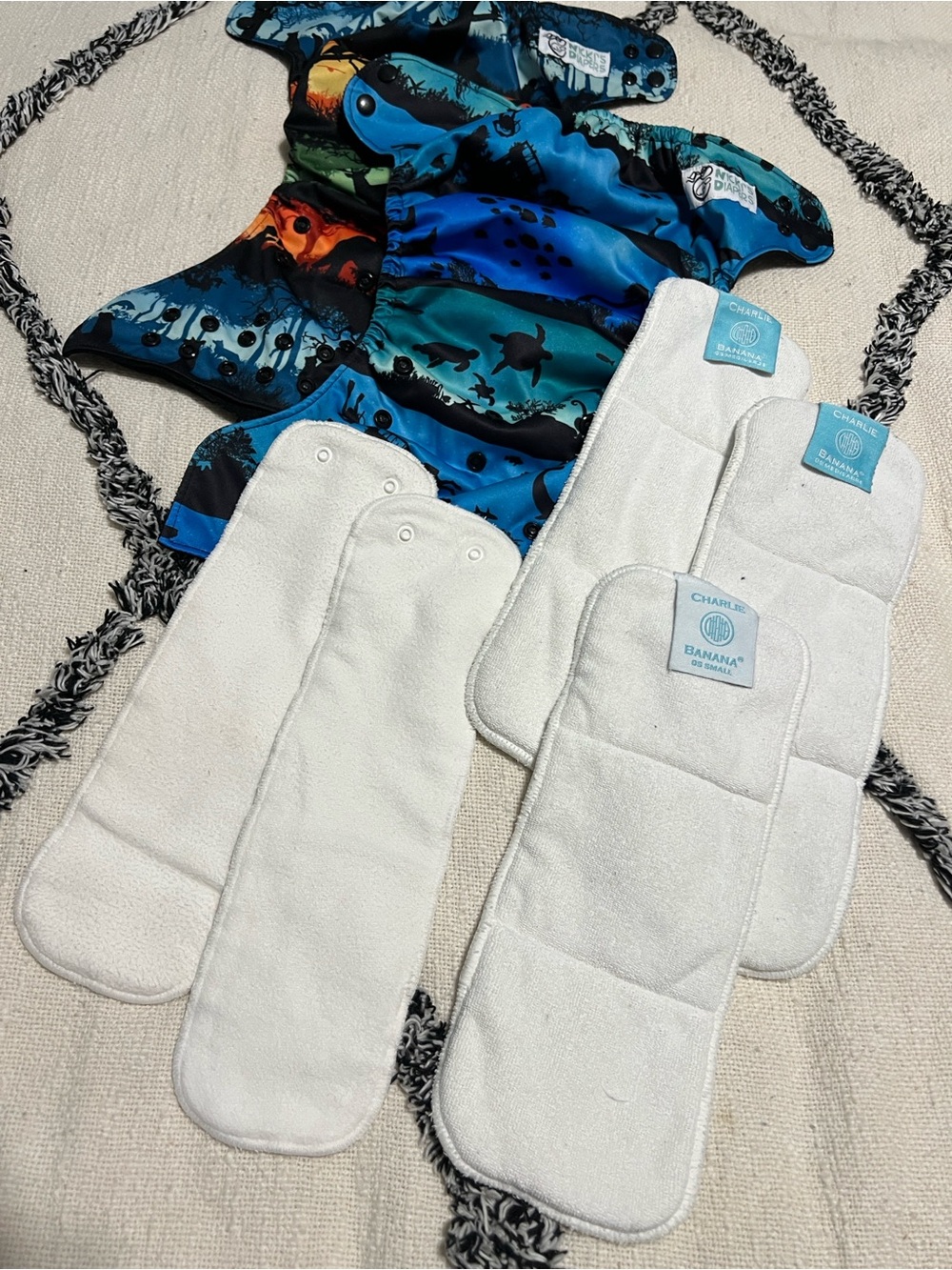 Two Nicki’s One Size Snap Pocket Diapers with 5 Inserts (3 are Charlie Banana)